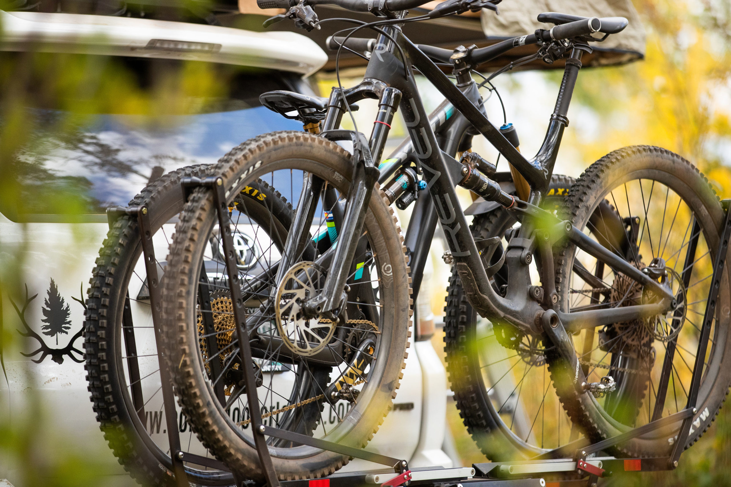 Image of a bike rack with two mountain bikes attached