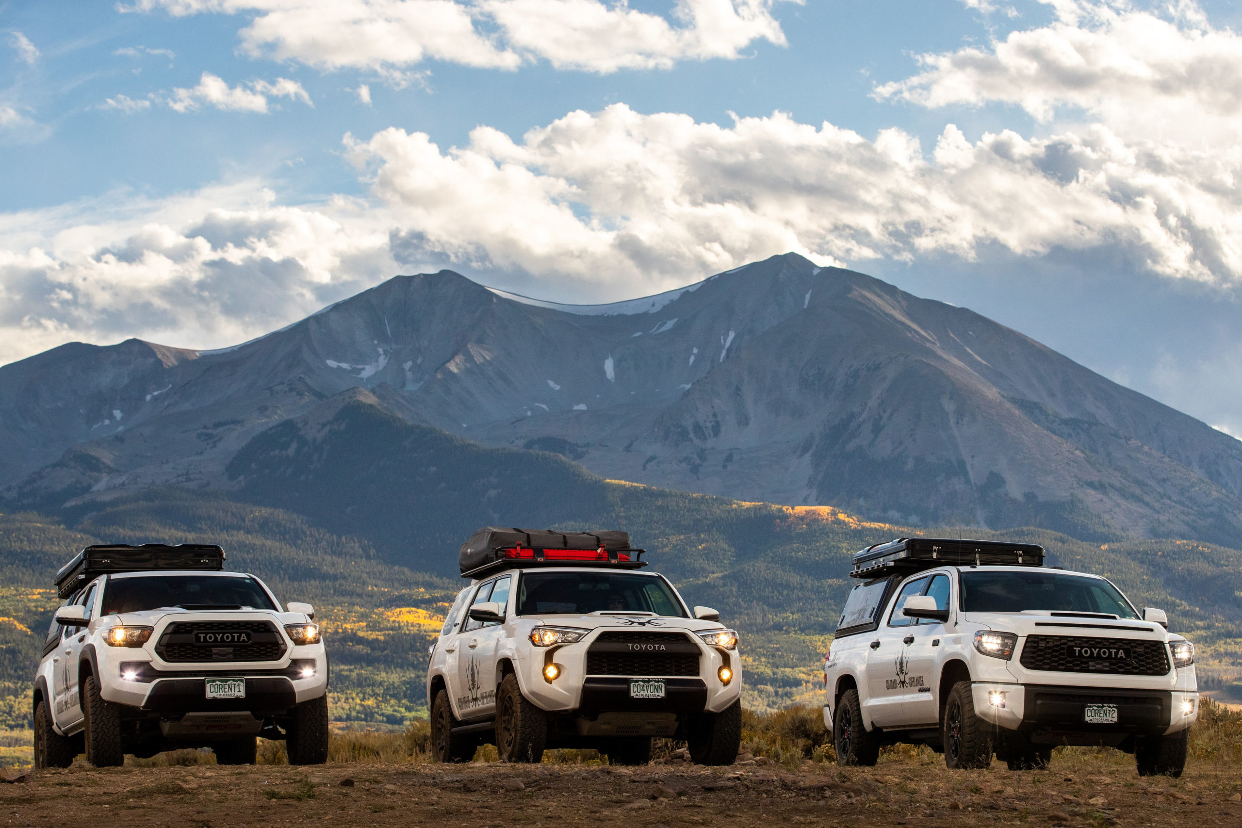 Image of three Colorado Overlander vehicles- a Toyota Tacoma, 4Runner, and Tundra in front of Mt. Sopris in the Roaring Fork Valley