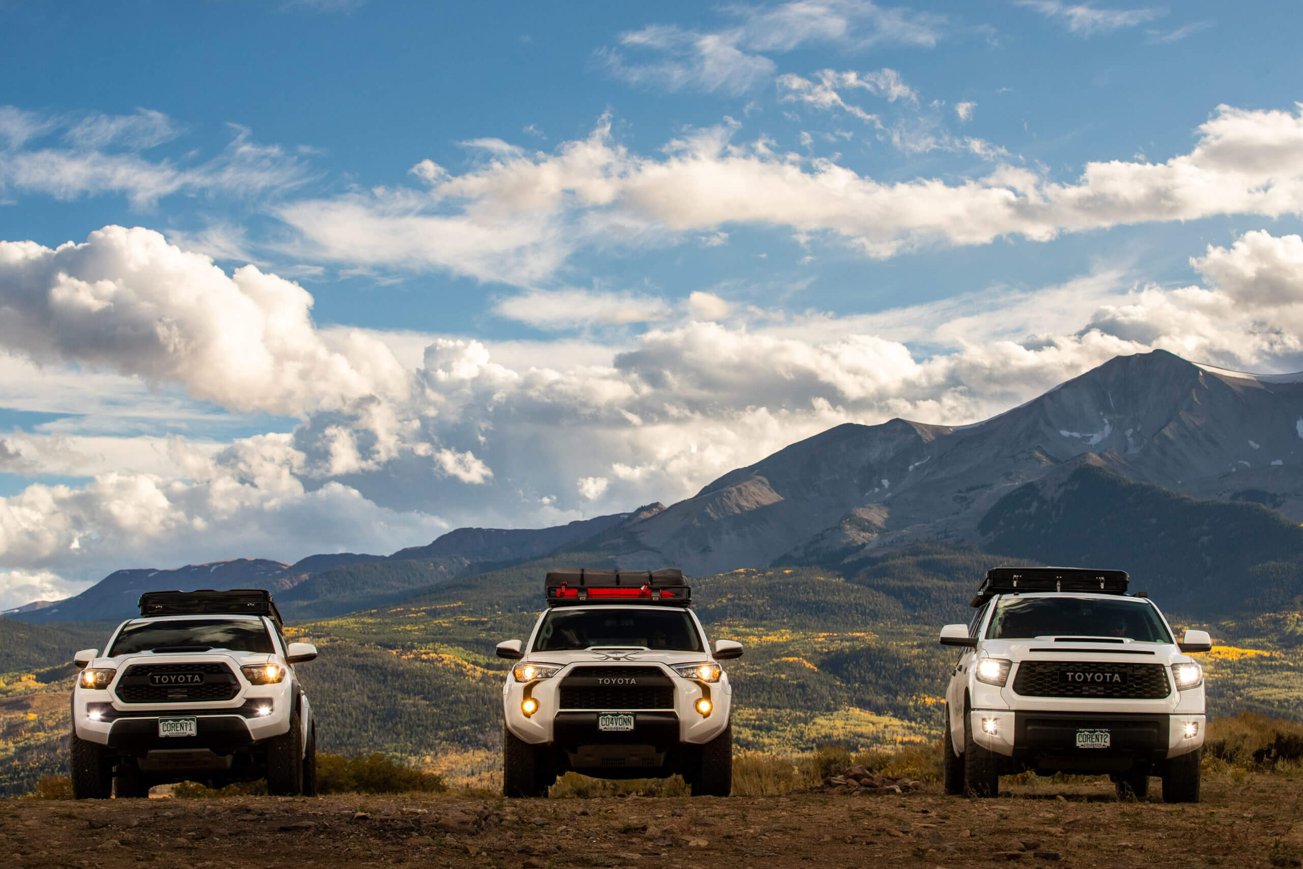 Image of three Colorado Overlander vehicles- a Toyota Tacoma, 4Runner, and Tundra