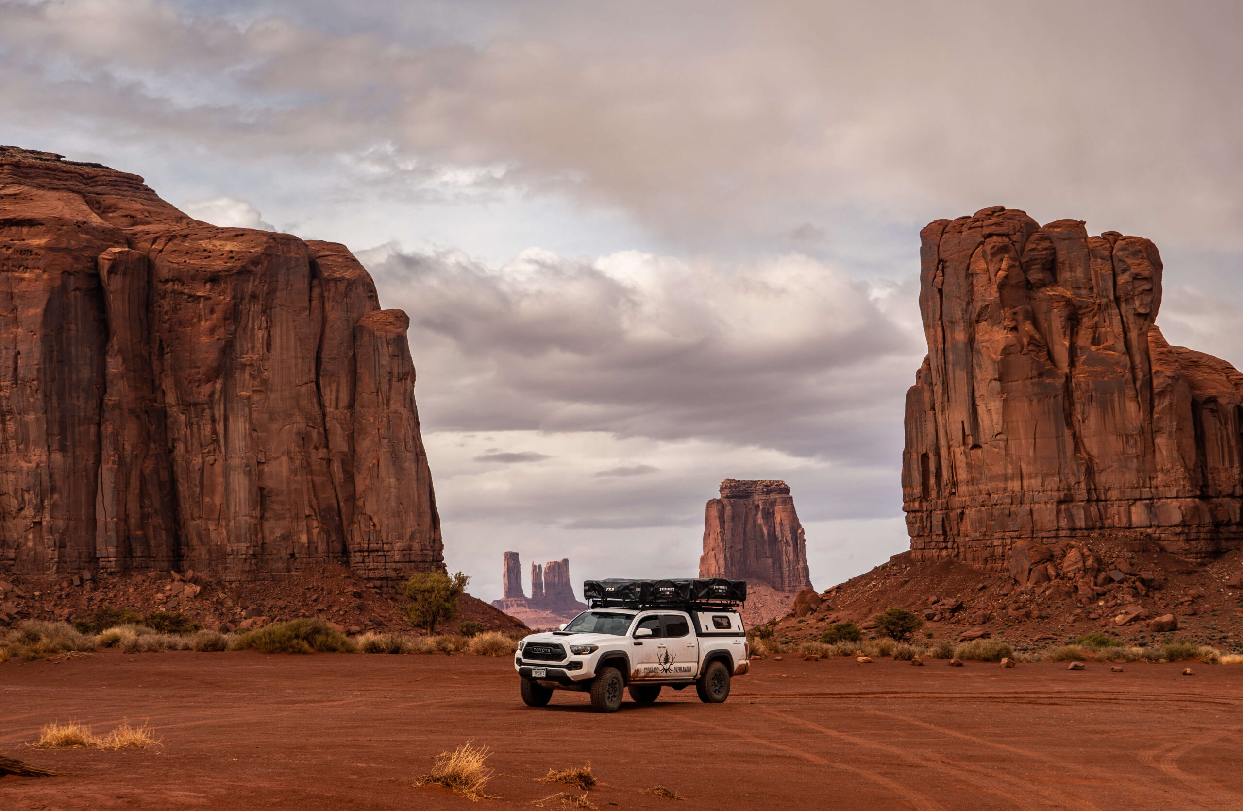 Image of a Colorado Overlander Toyota Tacoma surrounded by natural beauty in the desert