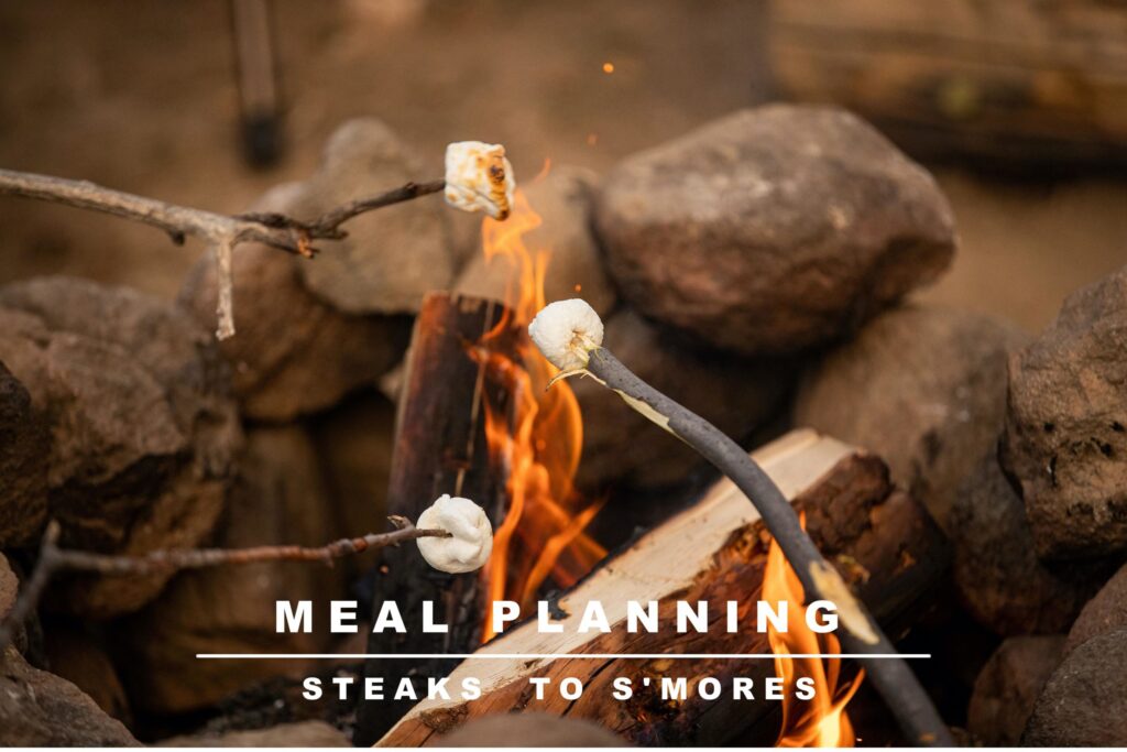 Image of smores roasting over a fire representing the meal planning from Colorado Overlander